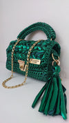 Premium metallic emerald green clutch