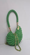 green metallic shell bag