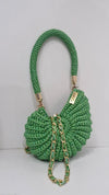 green metallic shell bag