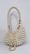 milky white metallic shell bag