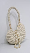 milky white metallic shell bag