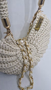 milky white metallic shell bag